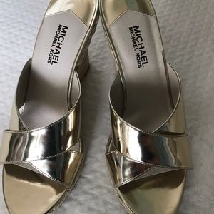 Brand new Michael Kors wedges. Never worn